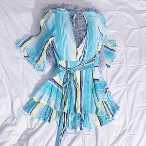 Blue and yellow romper with detailed back